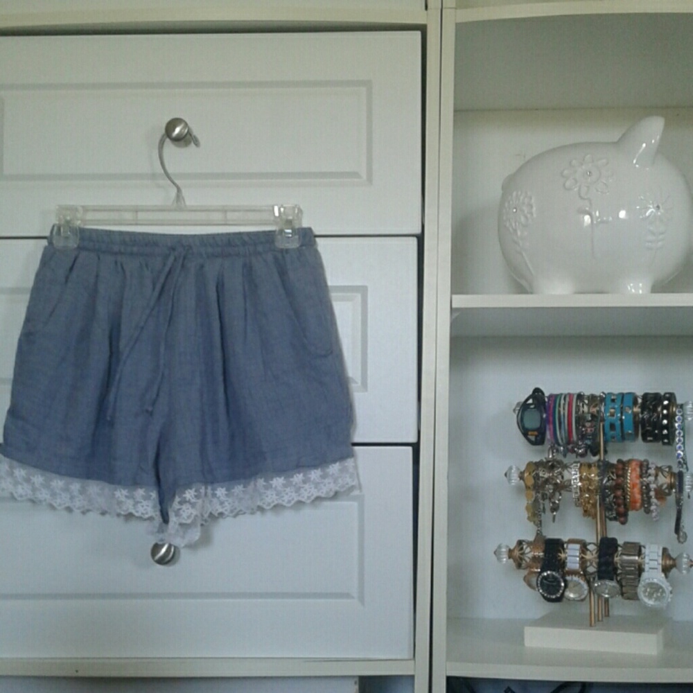 Blue shorts with flower decal